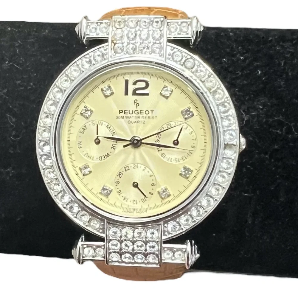 P. PEUGEOT YELLOW FACE & CROCODILE STAMPED BAND WITH CRYSTAL BEZEL WATCH